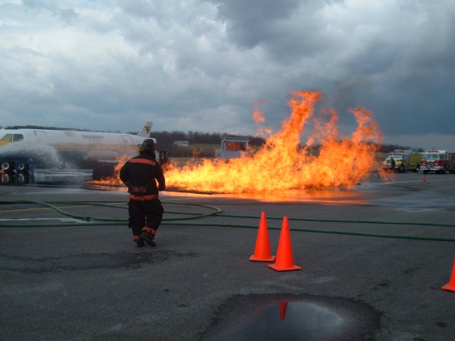 Fire pit in full operation during live aircraft simulator training.  